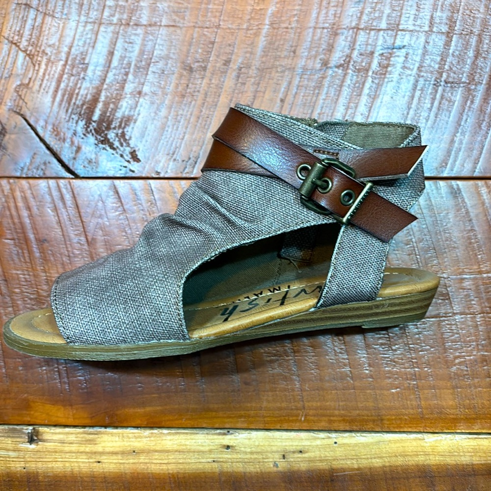 Blowfish Gladiator sandal, color is a gray/brown. Never worn. Size 6.
